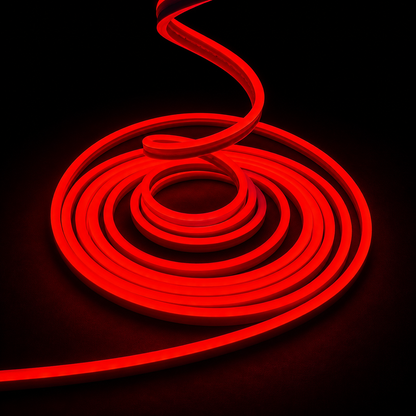 A coiled red neon light tube on a solid black background, showing a glowing red strip with a spiral pattern.