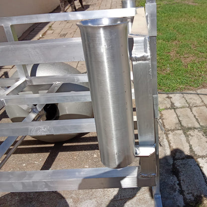 Close up of the rod holders and beach wheels on the 2 wheel beach trolley