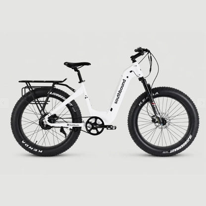 A white Southbound electric fat tire bike with black components, shown from a side profile against a light gray studio background.