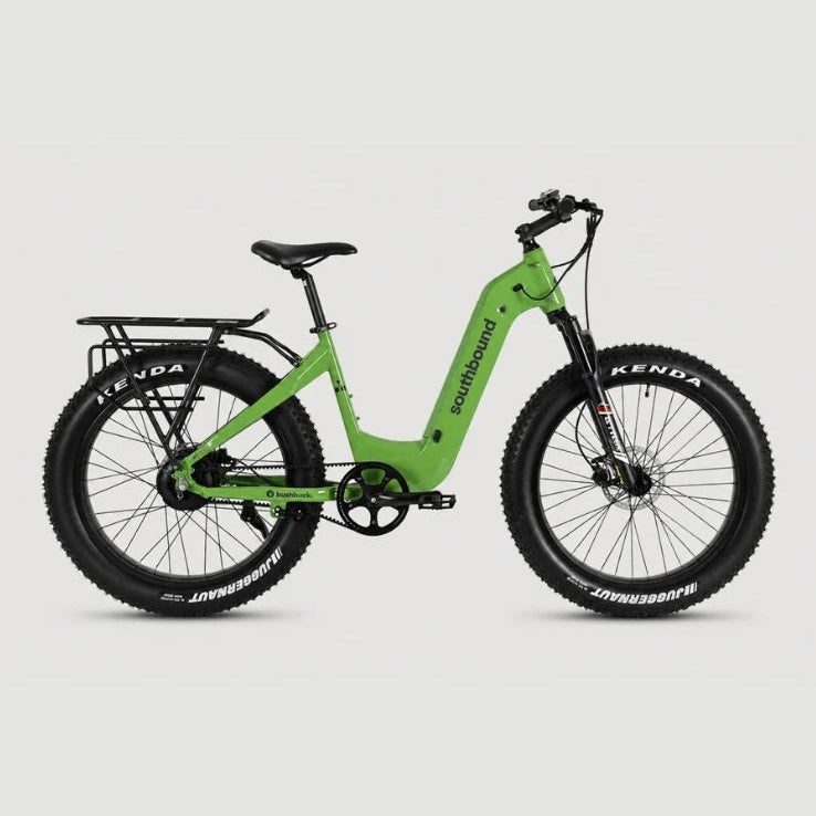 A green Southbound electric fat tire bike with black components, shown from a side profile view against a light gray background.