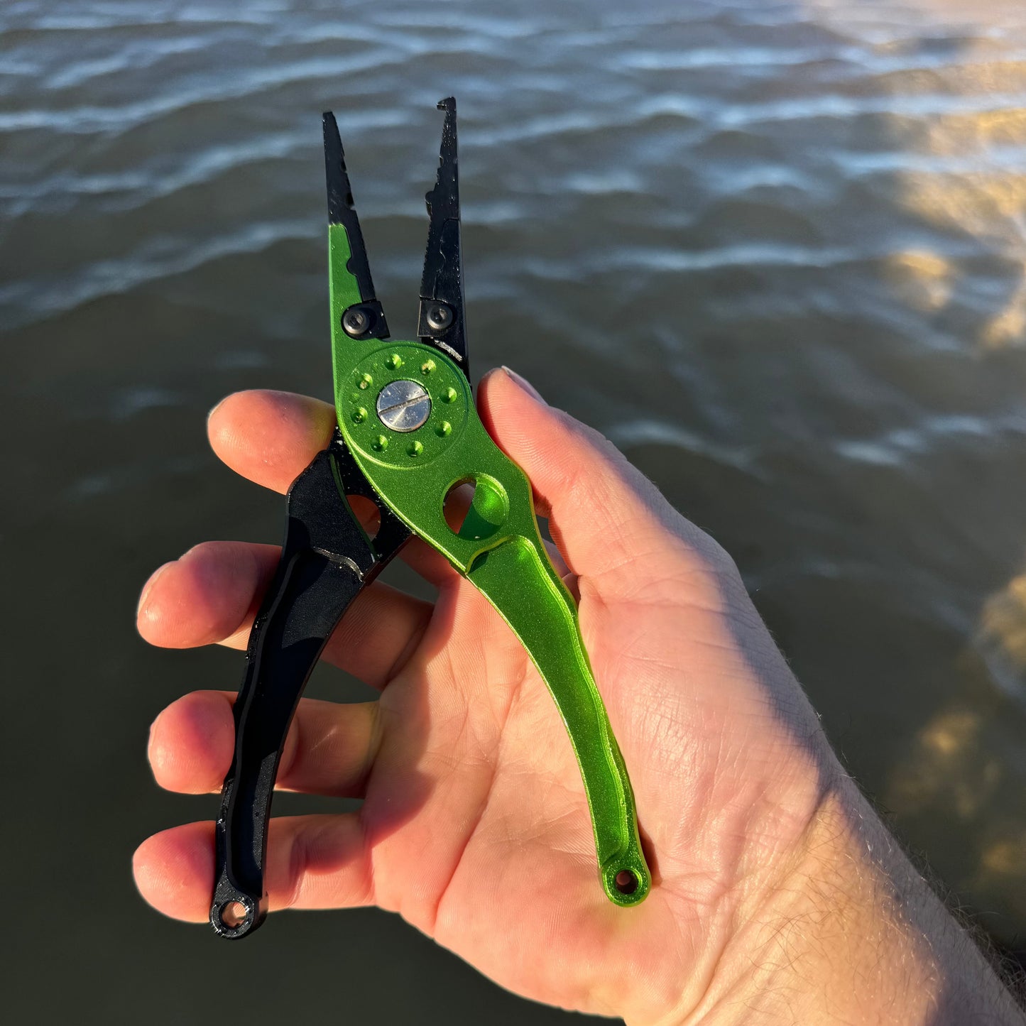 Salt ease fit pliers in green in hand operation