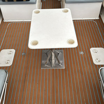 Brown and blue EVA decking installed in a boat cockpit
