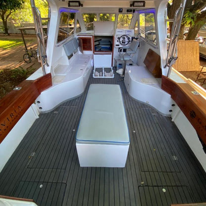 Grey and black EVA decking installed in a cabin boat cockpit