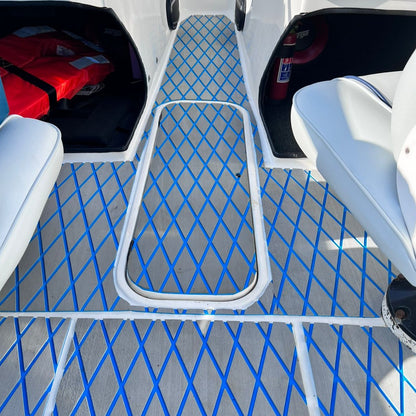 Grey and blue EVA decking with diamond pattern installed in a boat cockpit