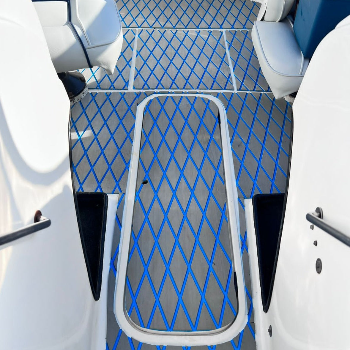 Grey and blue EVA decking with diamond pattern installed on a boat floor