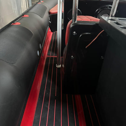 Red and black EVA decking installed on a RIB side walkway