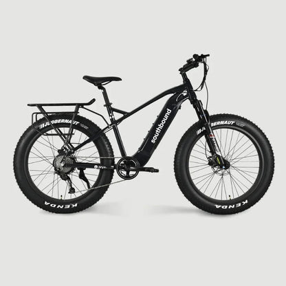 Southbound fat tyre electric bicycle with rear cargo rack, integrated battery and wide all-terrain tyres for beach riding, gravel roads and outdoor adventures.